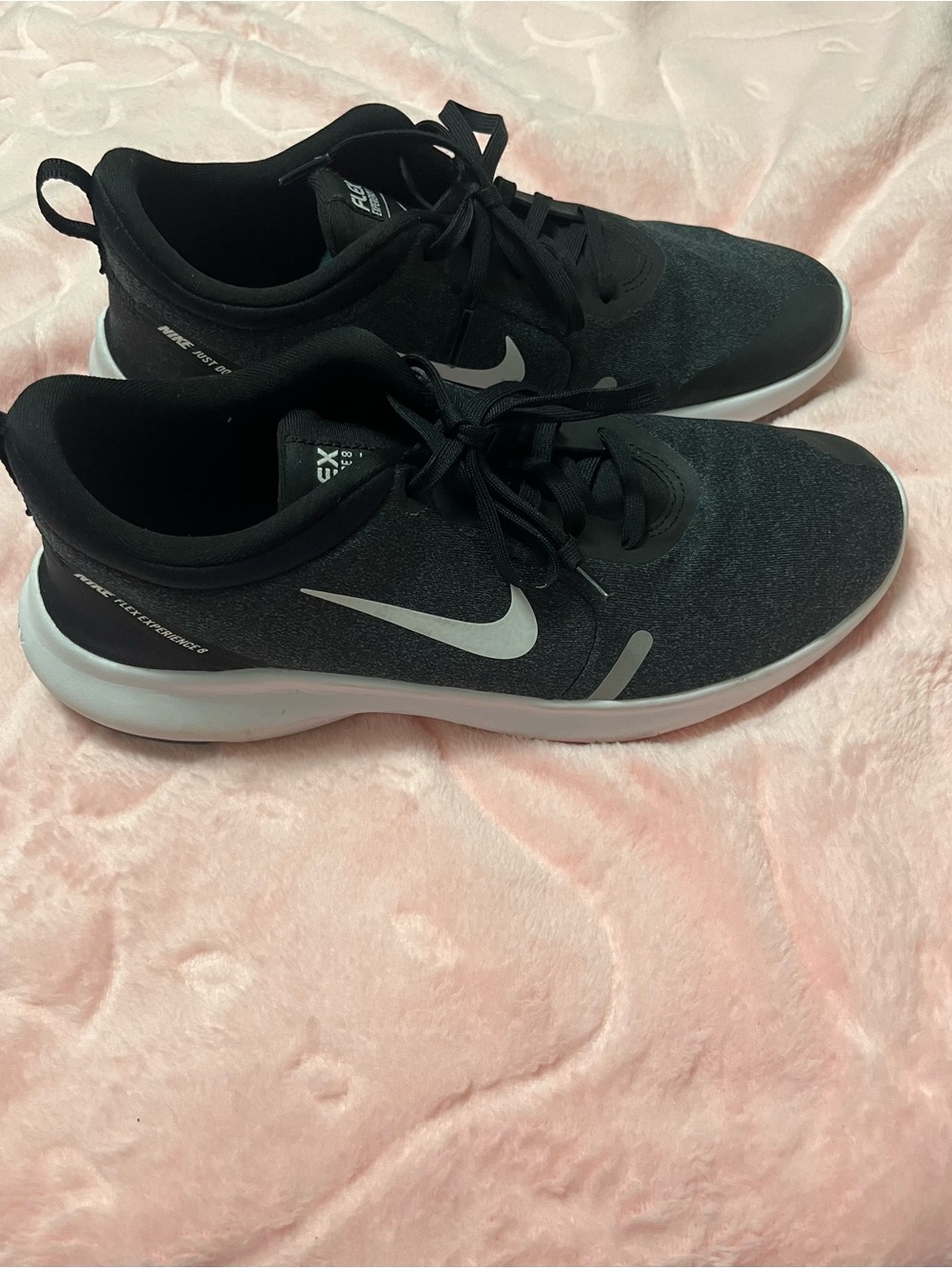 Nike Women’s Black Sneakers with White Swoosh